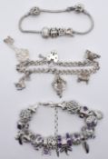 THREE SILVER CHARM BRACELETS