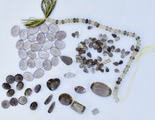 LOOSE GEMSTONES - A QUANTITY OF SMOKY QUARTZ GEMSTONES