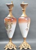 PAIR OF MID 20TH CENTURY HAND PAINTED WINE EWERS