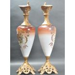 PAIR OF MID 20TH CENTURY HAND PAINTED WINE EWERS