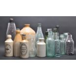 LARGE COLLECTION OF GLASS BOTTLES AND STONEWARE BOTTLES