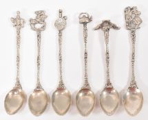 SIX SILVER DECORATIVE TEA SPOONS