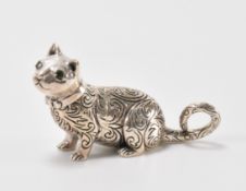 SILVER CAT FIGURINE WITH GREEN STONE EYES