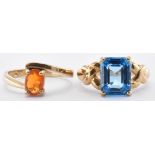 TWO 9CT GOLD RINGS SET WITH TOPAZ & FIRE OPAL