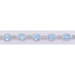 SILVER BLUE TOPAZ & CUBIC ZIRCONIA BRACELET