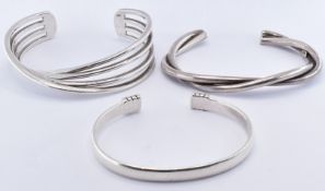 THREE SILVER BANGLE BRACELETS