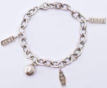 TIFFANY & CO SILVER CHARM BRACELET