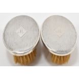 PAIR OF LEVI & SALAMAN SILVER BACKED BRUSHES