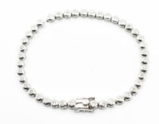 9CT HALLMARKED WHITE GOLD & DIAMOND TENNIS LINE BRACELET