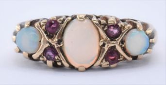 9CT GOLD OPAL & RUBY RING