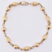 18CT GOLD BEADED BRACELET