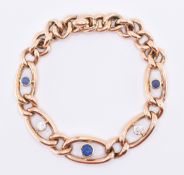 15CT GOLD DIAMOND & SAPPHIRE CURB LINK BRACELET