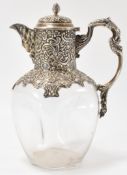 EDWARDIAN SILVER MOUNTED CLARET JUG