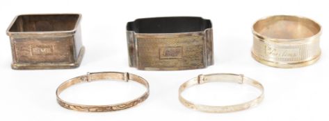 THREE SILVER HALLMARKED NAPKIN RINGS & BANGLES