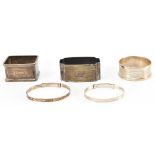 THREE SILVER HALLMARKED NAPKIN RINGS & BANGLES