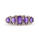 9CT GOLD AMETHYST FIVE STONE RING