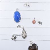 COLLECTION OF SILVER PENDANT NECKLACES