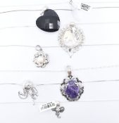 COLLECTION OF SILVER PENDANT NECKLACES