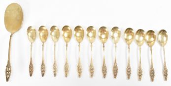 SIX CONTINENTAL SILVER GILT TEASPOONS & CAKE SLICE