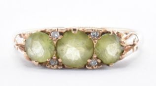 9CT GOLD THREE STONE PERIDOT RING