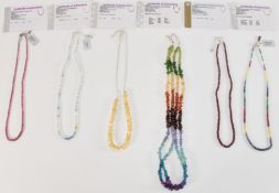 COLLECTION OF SIX TGGC AND OTHER GEMSTONE NECKLACES