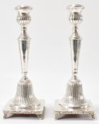 PAIR OF SILVER CANDLESTICKS