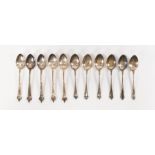 TWO SETS OF SILVER TEASPOONS