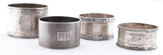 FIVE 20TH CENTURY SILVER NAPKIN RINGS