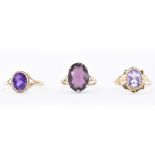 THREE AMETHYST SET RINGS INCLUDING 2 GOLD