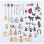ASSORTMENT OF VINTAGE STICK PINS & CHARMS