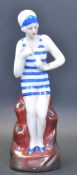 ART DECO STYLE CERAMIC FIGURINE OF LADY IN BATHING SUIT