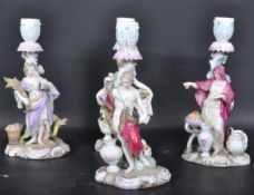 SET OF FOUR CONTINENTAL 20TH CENTURY CANDLESTICKS
