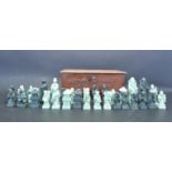 COLLECTION OF VINTAGE 20TH CENTURY CHESS PIECES WITHIN A FLORAL BOX