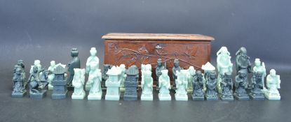 COLLECTION OF VINTAGE 20TH CENTURY CHESS PIECES WITHIN A FLORAL BOX