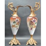 PAIR OF MID 20TH CENTURY HAND PAINTED WINE EWERS