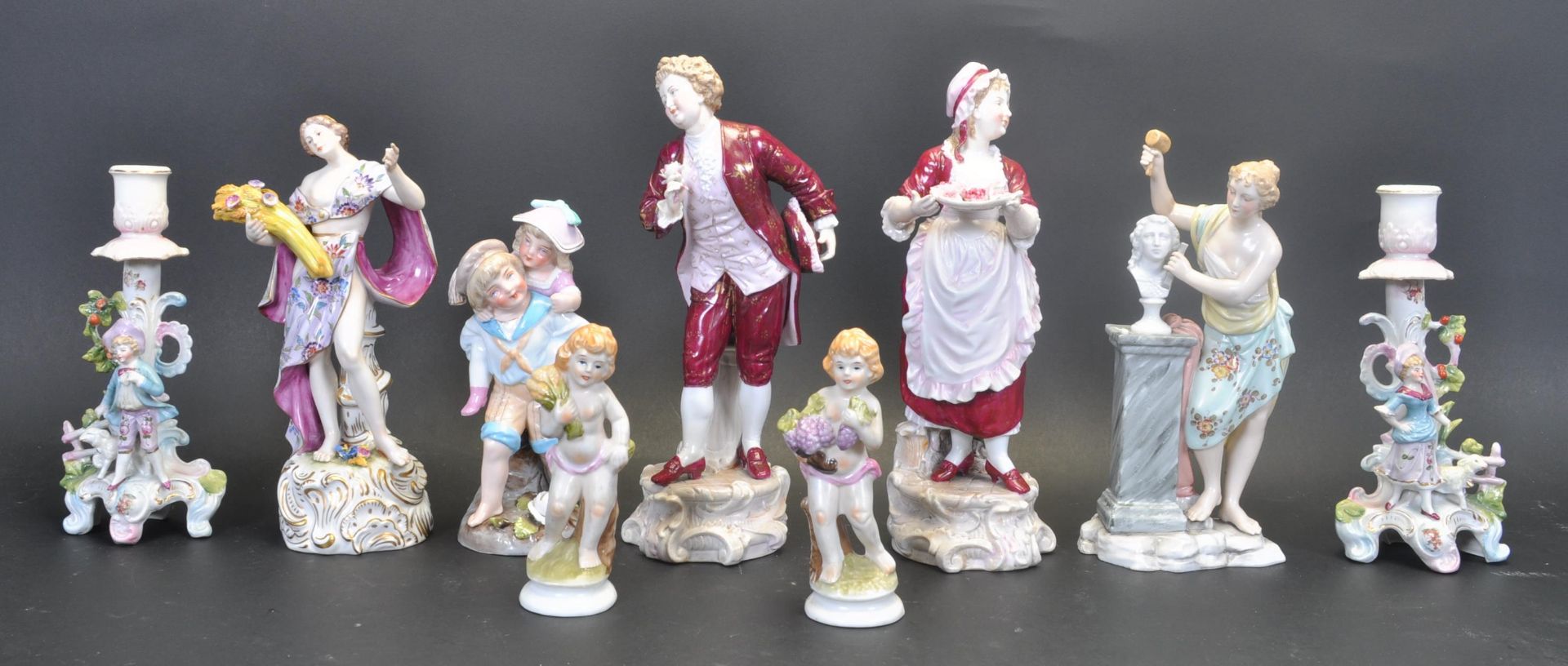 GRAOUP OF NINE PORCELAIN NEOCLASSICAL GERMAN FIGURINES