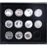 COLLECTION OF ELEVEN SILVER COMMEMORATIVE COINS