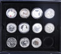 COLLECTION OF ELEVEN SILVER COMMEMORATIVE COINS