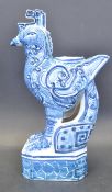 20TH CENTURY CHINESE REPUBLIC BLUE AND WHITE CERAMIC BIRD