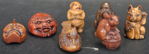 GROUP OF SEVEN JAPANESE ORIENTAL NETSUKE FIGURINES