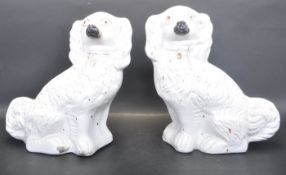 PAIR OF VICTORIAN STAFFORDSHIRE FIRE DOGS
