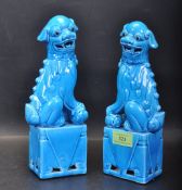 TWO TURQUOISE PORCELAIN CHINESE FOO DOG