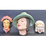 THREE ART DECO CERAMIC WALL PLAQUES