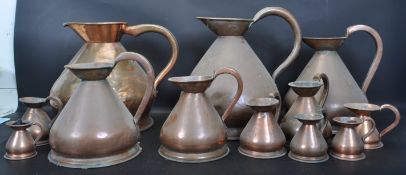 LARGE COLLECTION OF VINTAGE 20TH CENTURY COPPER CIDER JUGS