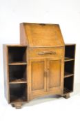 A 1920'S OAK STUDENT BUREAU OFFICE DESK