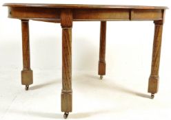 1920S SOLID OAK OVAL EXTENDING DINING TABLE
