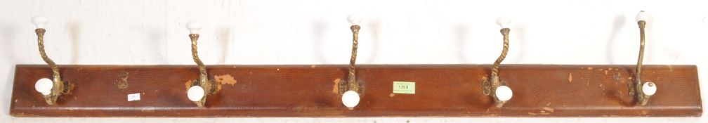 LATE 19TH CENTURY VICTORIAN WOOD, BRASS AND CERAMIC WALL HANGING COAT / HAT RACK