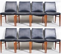 MATCHING SET OF EIGHT TEAK AND BLACK LEATHER DINING CHAIRS