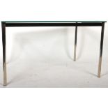 MANNER OF LE CORBUSIER - LC10 - CHROME AND GLASS DINING TABLE