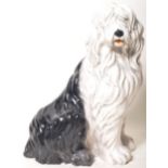 LARGE FLOOR STANDING CERAMIC FIGURE OF AN OLD ENGLISH SHEEP DOG